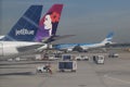 JetBlue, Hawaiian Airlines and Aerolineas Argentinas jets on tarmac at John F Kennedy International Airport