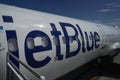 JetBlue plane on tarmac at Maurice Bishop International Airport in Grenada Royalty Free Stock Photo