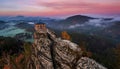Jetrichovice, Czech Republic - Aerial panoramic view of Mariina Vyhlidka lookout with foggy autumn landscape