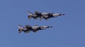 Four Jets flying in formation at an air show