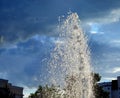 Jets of the fountain against the sky and clouds Royalty Free Stock Photo