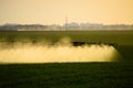 Jets of liquid fertilizer from the tractor sprayer Royalty Free Stock Photo