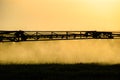 Jets of liquid fertilizer from the tractor sprayer Royalty Free Stock Photo