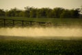 Jets of liquid fertilizer from the tractor sprayer Royalty Free Stock Photo