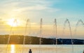 Jets of water fountain on the background sky and sun Royalty Free Stock Photo