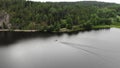 Jetski in Ladoga lake near Snake Mountain Lahdenpohja Karelia. Big rock forest