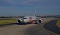 Jetstar aircraft moving on the runway with front profile at Sydney Airport Royalty Free Stock Photo