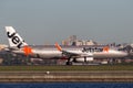 Jetstar Airways Airbus A320 airliner landing at Sydney Airport. Royalty Free Stock Photo