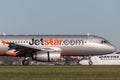 Jetstar Airways Airbus A320 airliner landing at Sydney Airport. Royalty Free Stock Photo