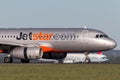 Jetstar Airways Airbus A320 airliner landing at Sydney Airport. Royalty Free Stock Photo