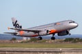 Jetstar Airways Airbus A320 airliner taking off from Sydney Airport. Royalty Free Stock Photo