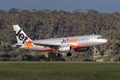 Jetstar Airways Airbus A320-232 VH-VGO landing at Melbourne International Airport.