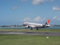 Jetstar Airways plane landing on Bali airport