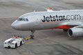 Jetstar Asia Airbus 320 being pushed back for departure