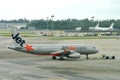 Jetstar Asia Airbus 320 being pushed back Royalty Free Stock Photo