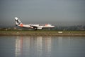Jetstar passenger jet arrives at Kingsford-Smith airport. Sydney
