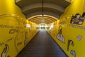 Jette, Brussels Belgium - the yellow pedestrian tunnel at the railwaystation