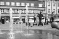 The jetting of the fountain in the city square.