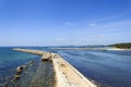 Jetty with blue sea Royalty Free Stock Photo