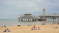 Jetty with bungy jumping tower on the the northsea coast in Scheveningen