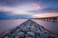 Jetty and the Chesapeake Bay Bridge at Sandy Point State Park, in Annapolis, Maryland Royalty Free Stock Photo