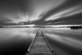 Jetty on a lake in black and white Royalty Free Stock Photo