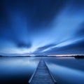 Jetty on a lake at dawn in The Netherlands Royalty Free Stock Photo