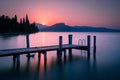 Jetty on Lake Garda at sunrise Royalty Free Stock Photo