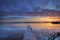 Jetty on a lake at sunrise, near Amsterdam The Netherlands Royalty Free Stock Photo