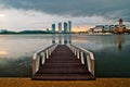 Jetty at lakeside with colorful sunrise. Pullman, Putrajaya, Malaysia Royalty Free Stock Photo