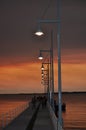 Jetty with lights and fishermen at sunset Perth Rockingham Western Australia Royalty Free Stock Photo