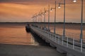 Jetty with lights at sunset Perth Rockingham Western Australia Royalty Free Stock Photo