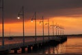 Pier with lights at sunset Perth Rockingham Western Australia