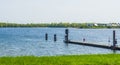 Jetty in Tholen city with cottages in the background, Oosterschelde, bergse diepsluis, Zeeland, The netherlands