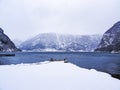 Jetty in a winter landscape at the fjord lake, Norway