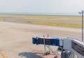 Jetway waiting for a plane to arrive on airport. airport terminal boarding gate. Royalty Free Stock Photo