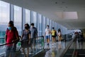 Jewel Changi Airport: visitors wearing face masks walking on travelator; social distancing. In phase 2 reopening