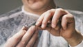 Jeweler fixes stones in a gold ring