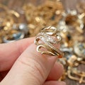 jeweler looking at ring as snake with diamonds, Royalty Free Stock Photo