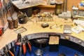 Jeweler`s workplace with a multitude of working tools