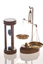 Jeweler scale and hourglass Royalty Free Stock Photo