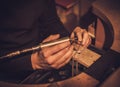 Jeweler at work in jewelery workshop Royalty Free Stock Photo