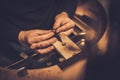 Jeweler at work in jewelery workshop Royalty Free Stock Photo