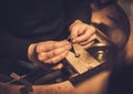 Jeweler at work in jewelery workshop Royalty Free Stock Photo