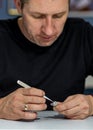 Jeweler working on a ring with stones