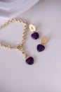 Set of necklace and earrings with amethyst stone Royalty Free Stock Photo