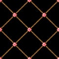 Seamless pattern with crossed golden chains and red round gemstones