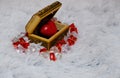 Jewelry box with a heart inside. Painted wooden box for decoration with gold rings inside. Soft fluffy backgroundr. Royalty Free Stock Photo