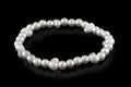 Jewelry bracelet from white pearls of small size Royalty Free Stock Photo