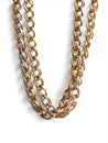 Jewelry chain, made of gold and silver links on white Royalty Free Stock Photo